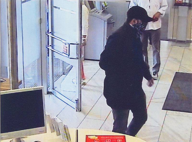  Die Polizei sucht diesen Bankräuber. 